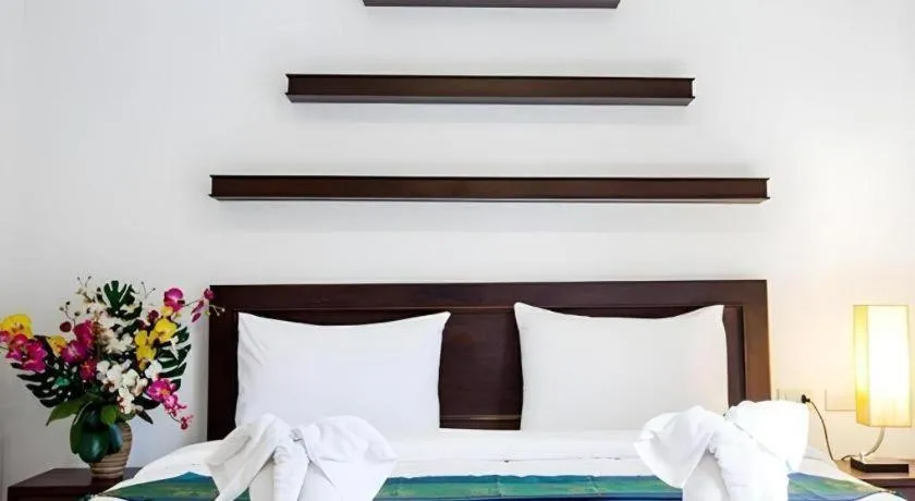 Bed in Triple Rund Place Hotel