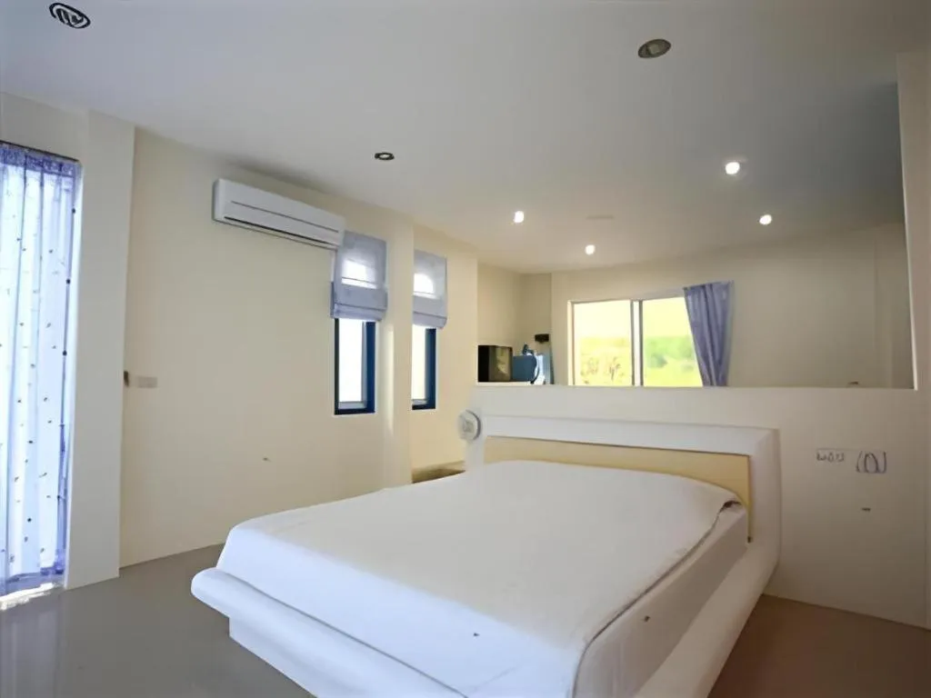 Bed in Anavilla Tangke Resort