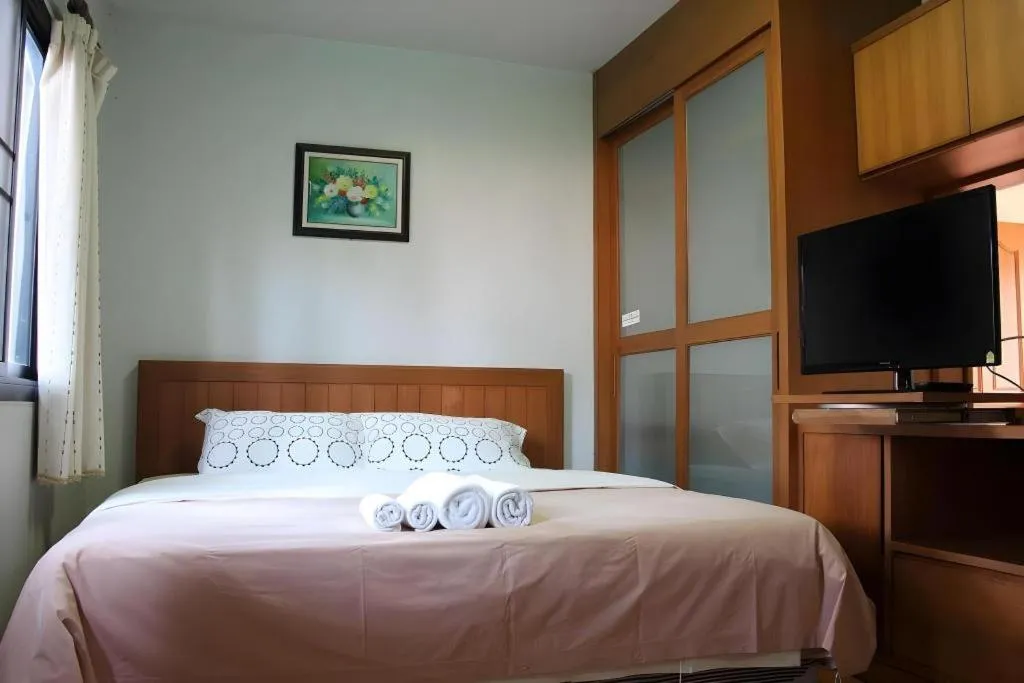 Bed in Chayada Garden House and Resort Hotel