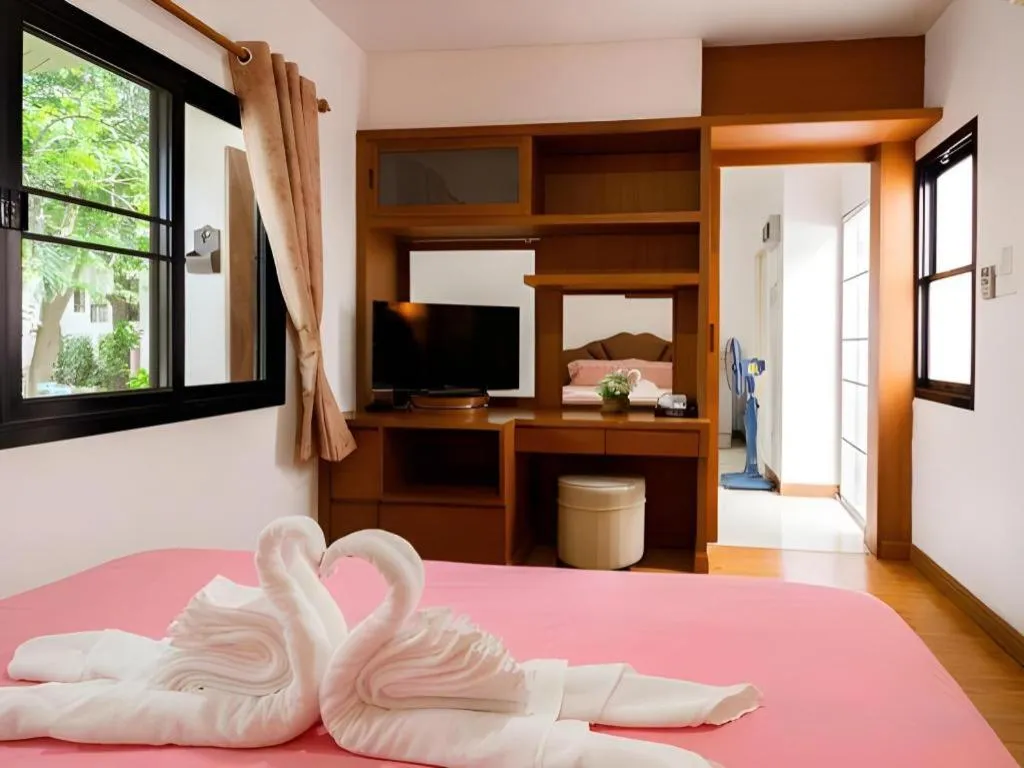 Bed in Chayada Garden House and Resort Hotel