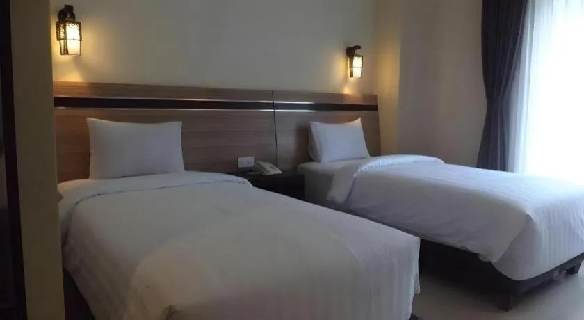 Bed in Puri Indah Hotel