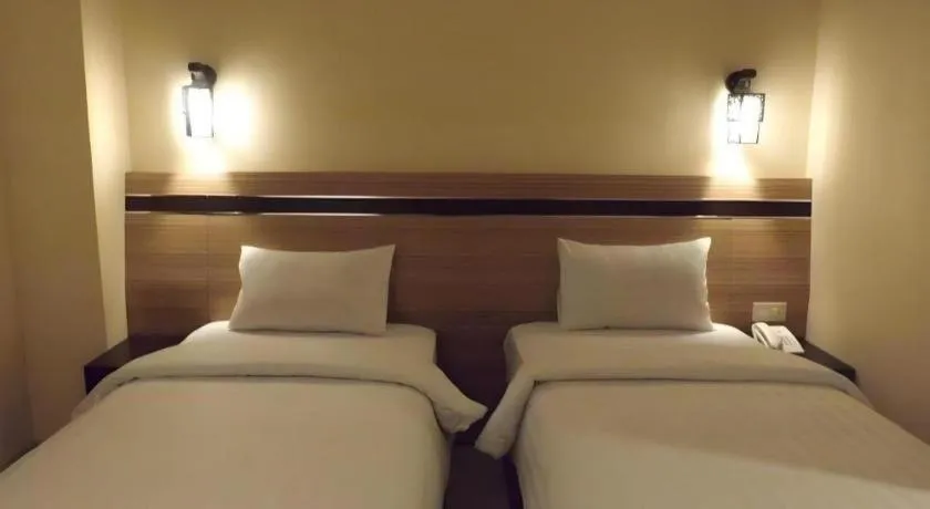 Bed in Puri Indah Hotel