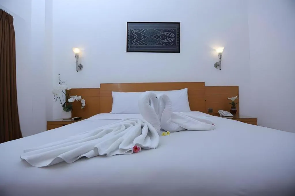 Bed in Puri Indah Hotel