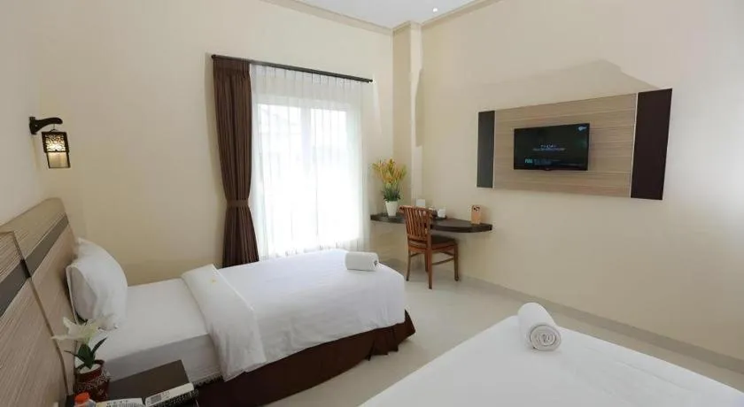 Bed in Puri Indah Hotel