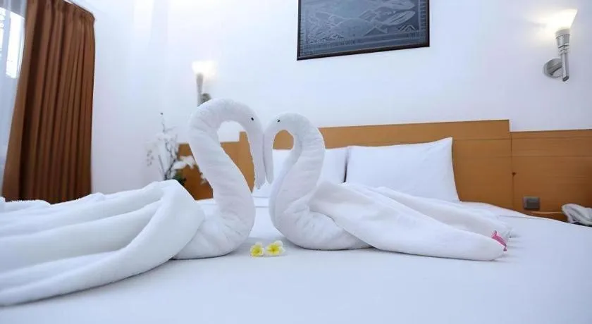 Bed in Puri Indah Hotel