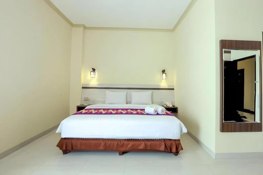 Bed in Puri Indah Hotel