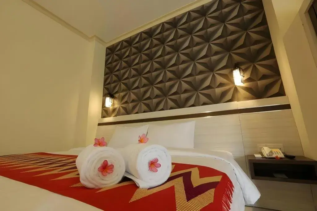 Bed in Puri Indah Hotel Bed in Puri Indah Hotel