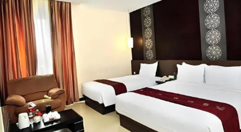 Bed in Savali Hotel