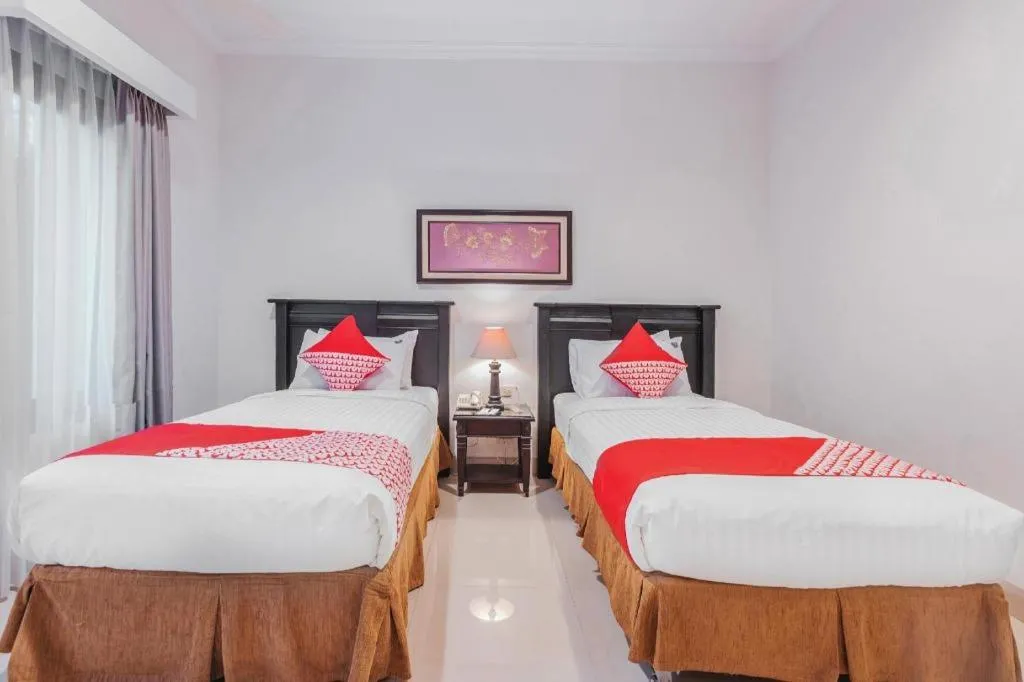 Bed in Sriwijaya Hotel