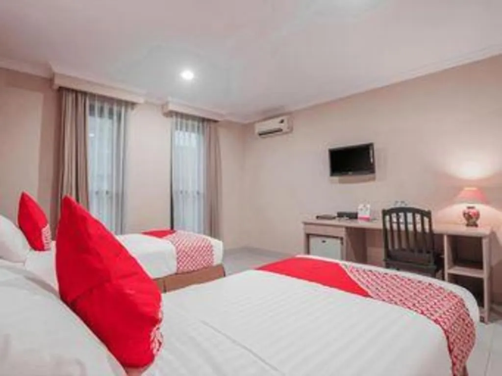 Bed in Sriwijaya Hotel