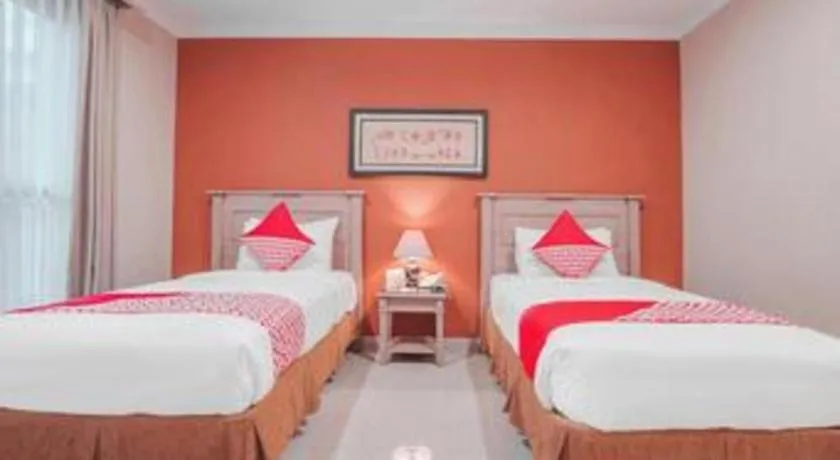 Bed in Sriwijaya Hotel