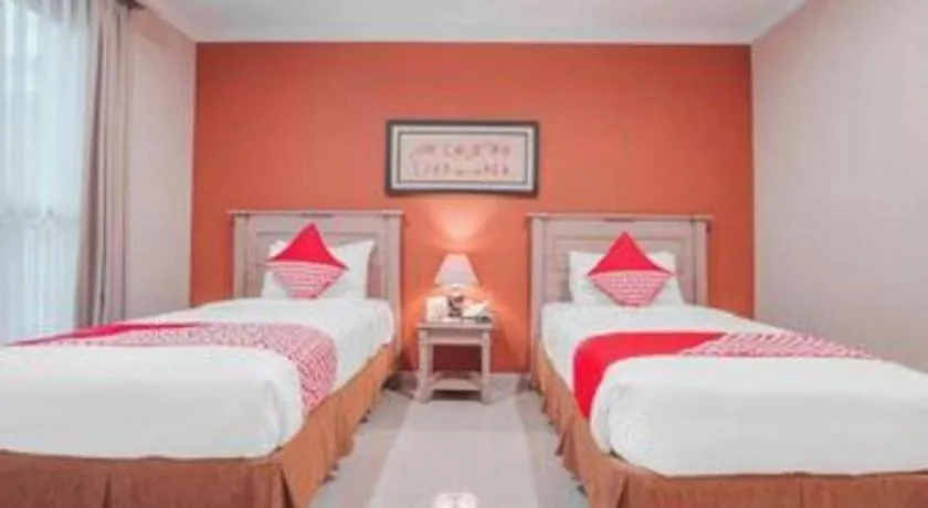 Bed in Sriwijaya Hotel