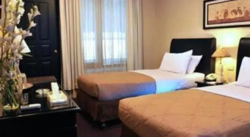 Bed in Sriwijaya Hotel Bed in Sriwijaya Hotel