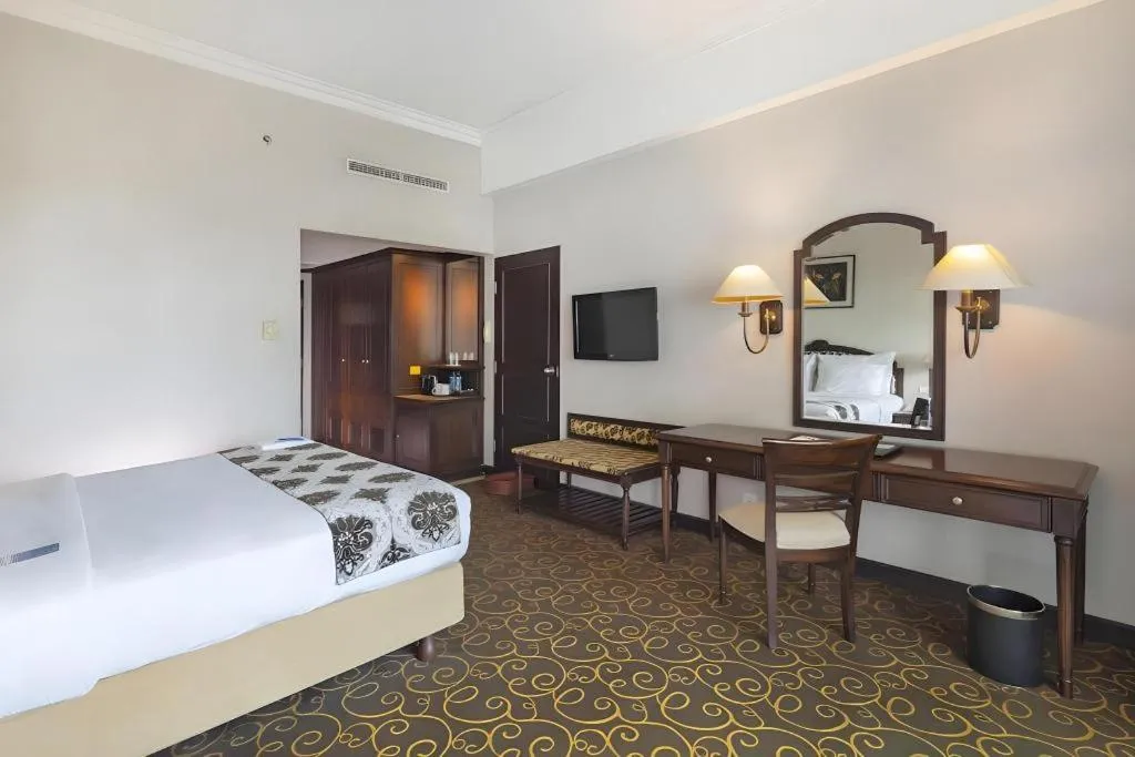 Bed in Blue Sky Hotel