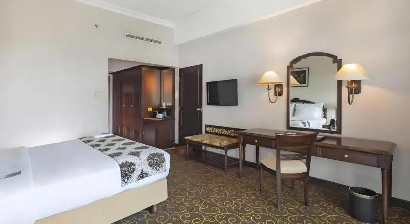 Bed in Blue Sky Hotel