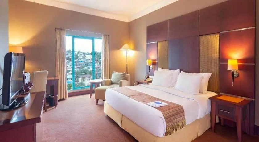 Bed in Blue Sky Hotel