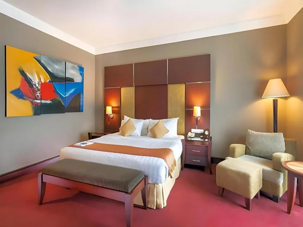 Bed in Blue Sky Hotel