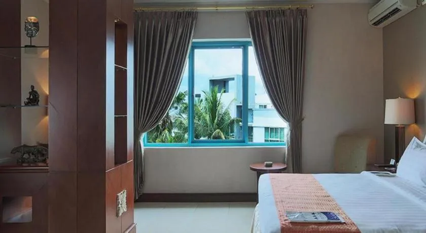 Bed in Blue Sky Hotel