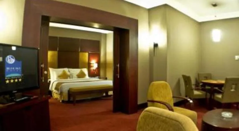 Bed in Blue Sky Hotel