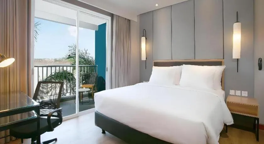 Bed in Blue Sky Hotel