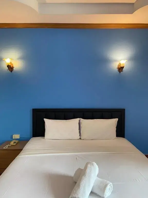 Bed in SR Hotel Bed in SR Hotel