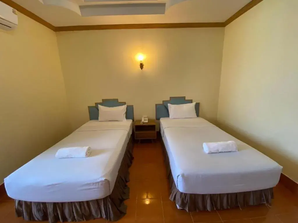 Bed in SR Hotel Bed in SR Hotel