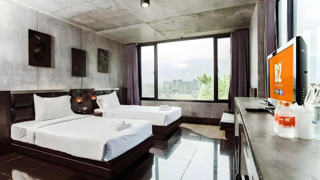 Bed in B2 Black Business and Budget Hotel