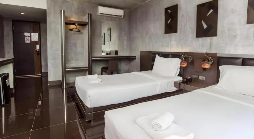 Bed in B2 Black Business and Budget Hotel