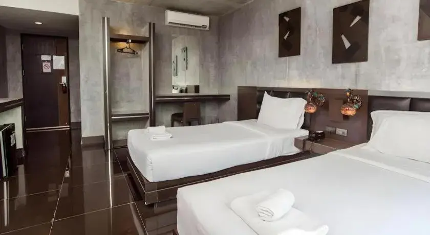 Bed in B2 Black Business and Budget Hotel Bed in B2 Black Business and Budget Hotel