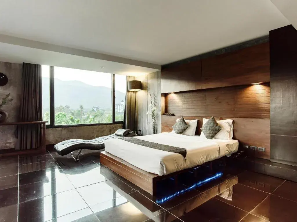 Bed in B2 Black Business and Budget Hotel Bed in B2 Black Business and Budget Hotel