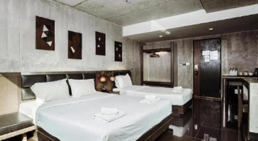 Bed in B2 Black Business and Budget Hotel