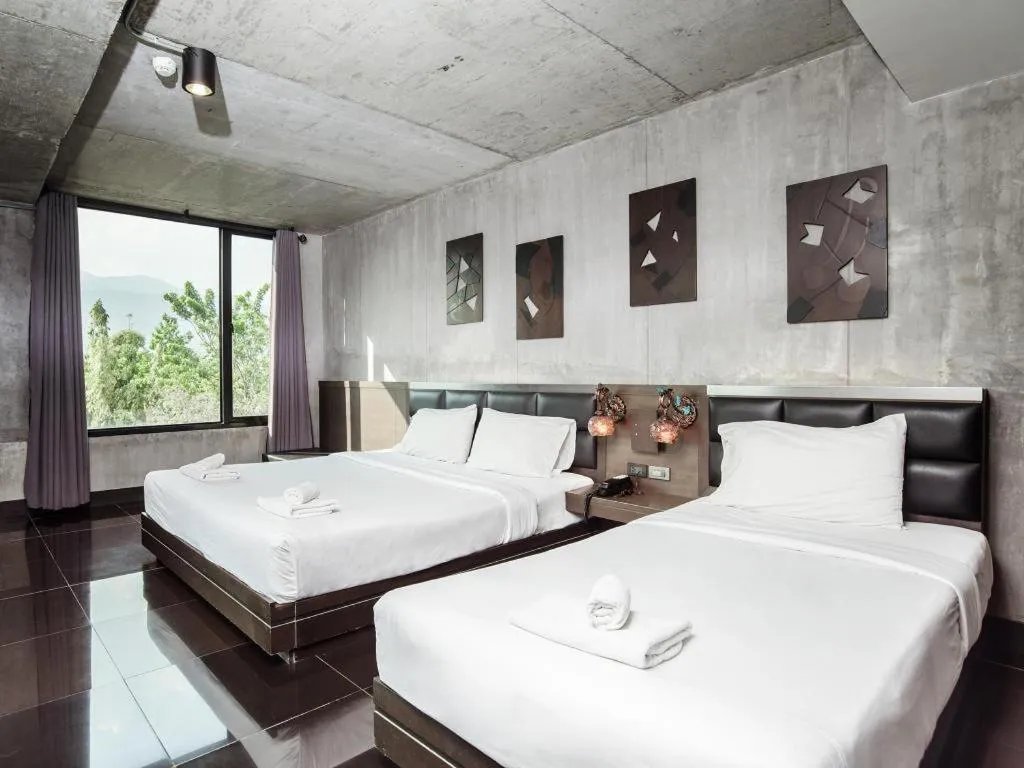 Bed in B2 Black Business and Budget Hotel