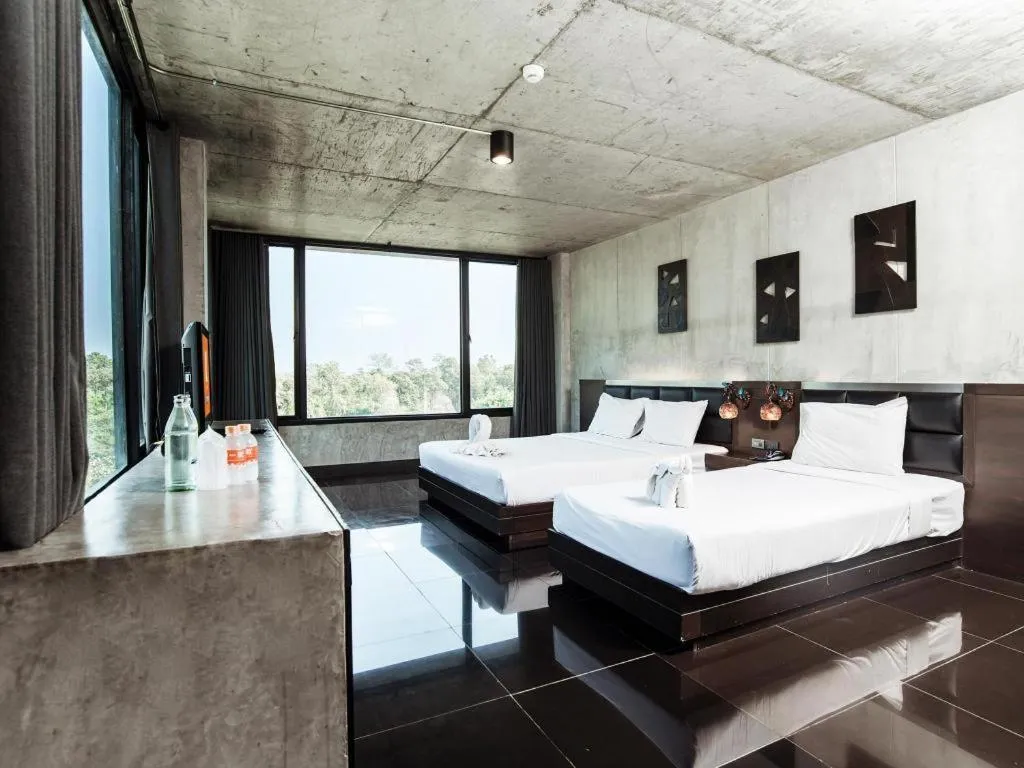 Bed in B2 Black Business and Budget Hotel