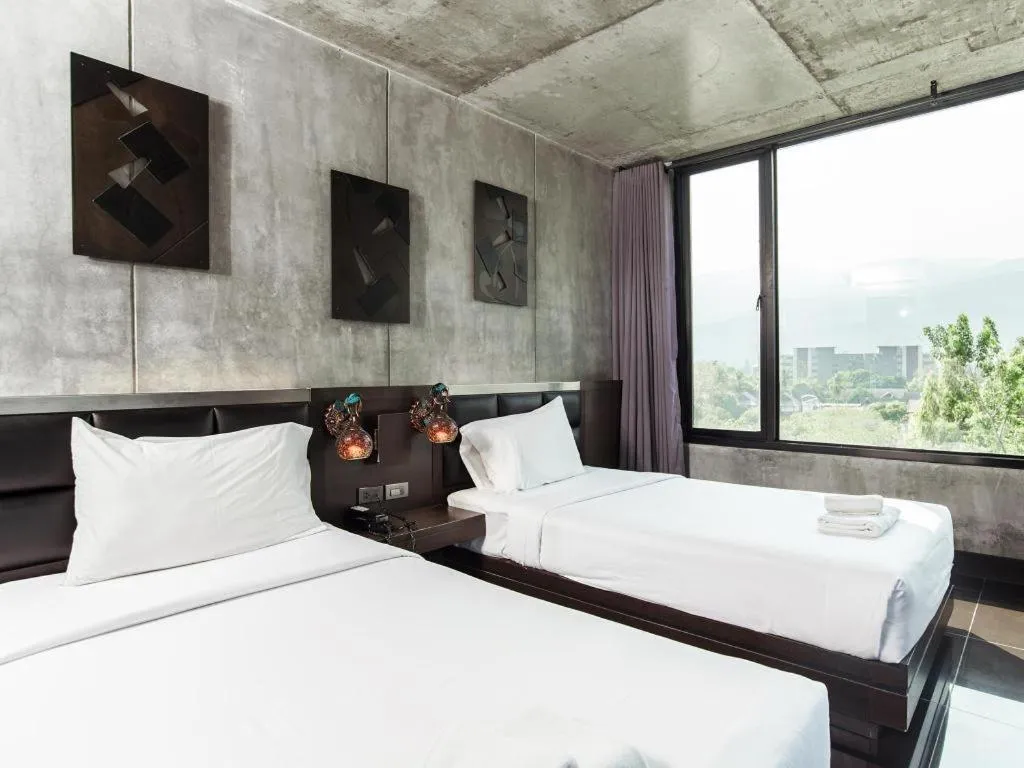 Bed in B2 Black Business and Budget Hotel