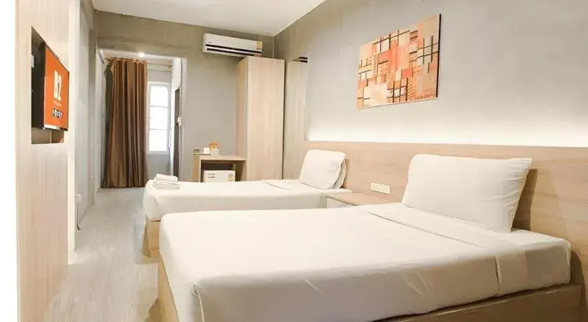 Bed in B2 Santitham Boutique & Budget Hotel Bed in B2 Santitham Boutique & Budget Hotel