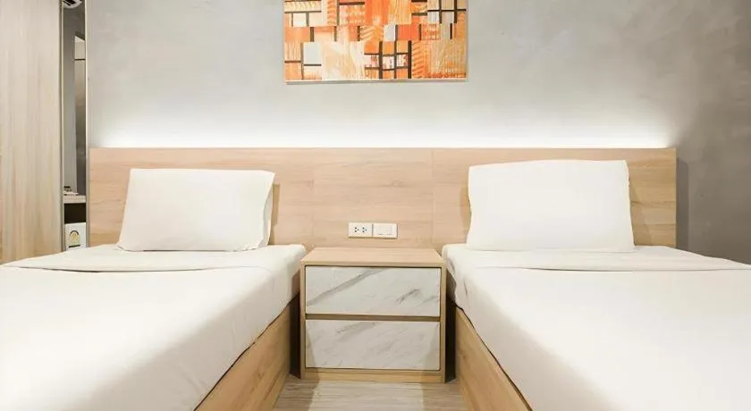 Bed in B2 Santitham Boutique & Budget Hotel