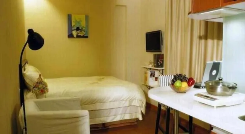 Bed in GreenTree Inn Suites HongQiao Airport Branch