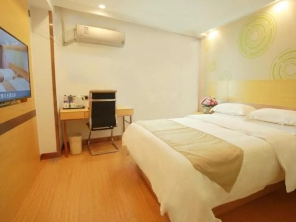Bed in GreenTree Inn Suites HongQiao Airport Branch