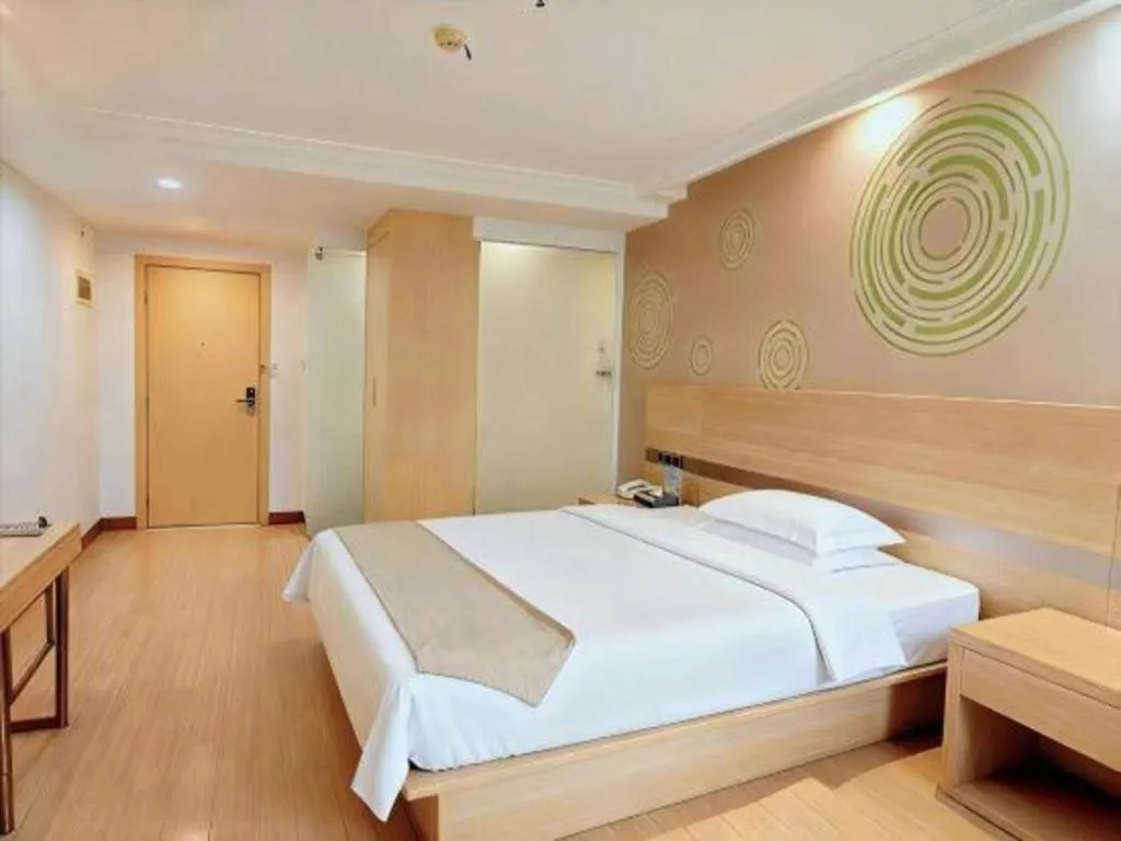 Bed in GreenTree Inn Suites HongQiao Airport Branch