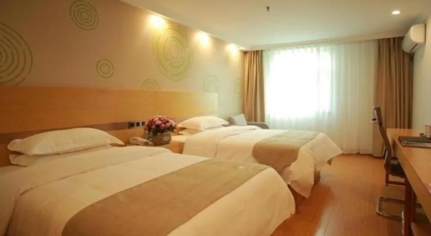Bed in GreenTree Inn Suites HongQiao Airport Branch