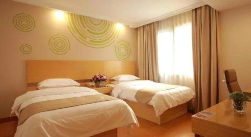 Bed in GreenTree Inn Suites HongQiao Airport Branch