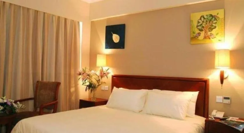 Bed in GreenTree Inn Suites HongQiao Airport Branch