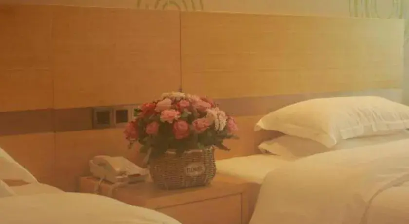 Bed in GreenTree Inn Suites HongQiao Airport Branch Bed in GreenTree Inn Suites HongQiao Airport Branch