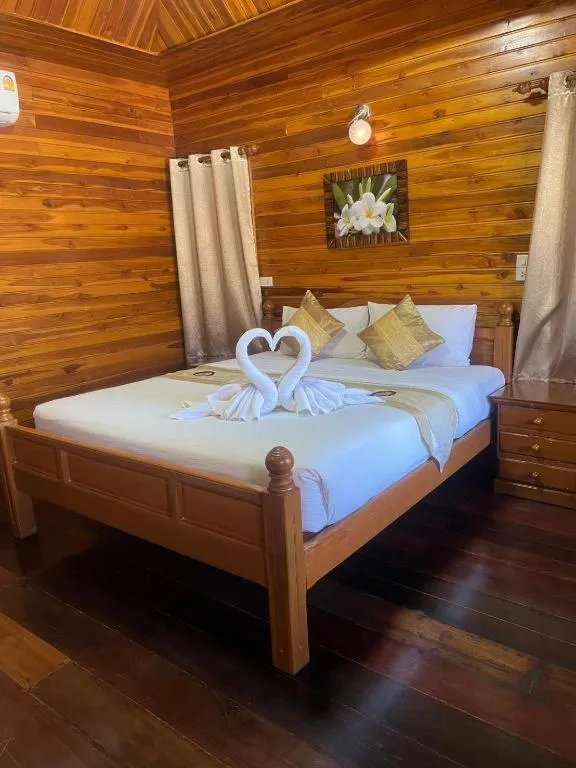 Bed in Srisawat Resort