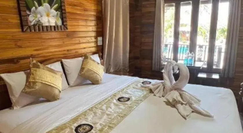 Bed in Srisawat Resort Bed in Srisawat Resort