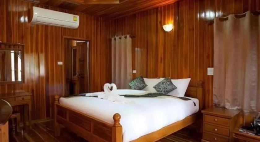 Bed in Srisawat Resort