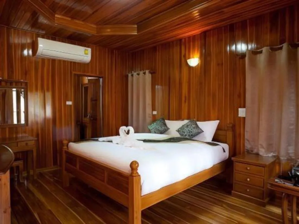 Bed in Srisawat Resort
