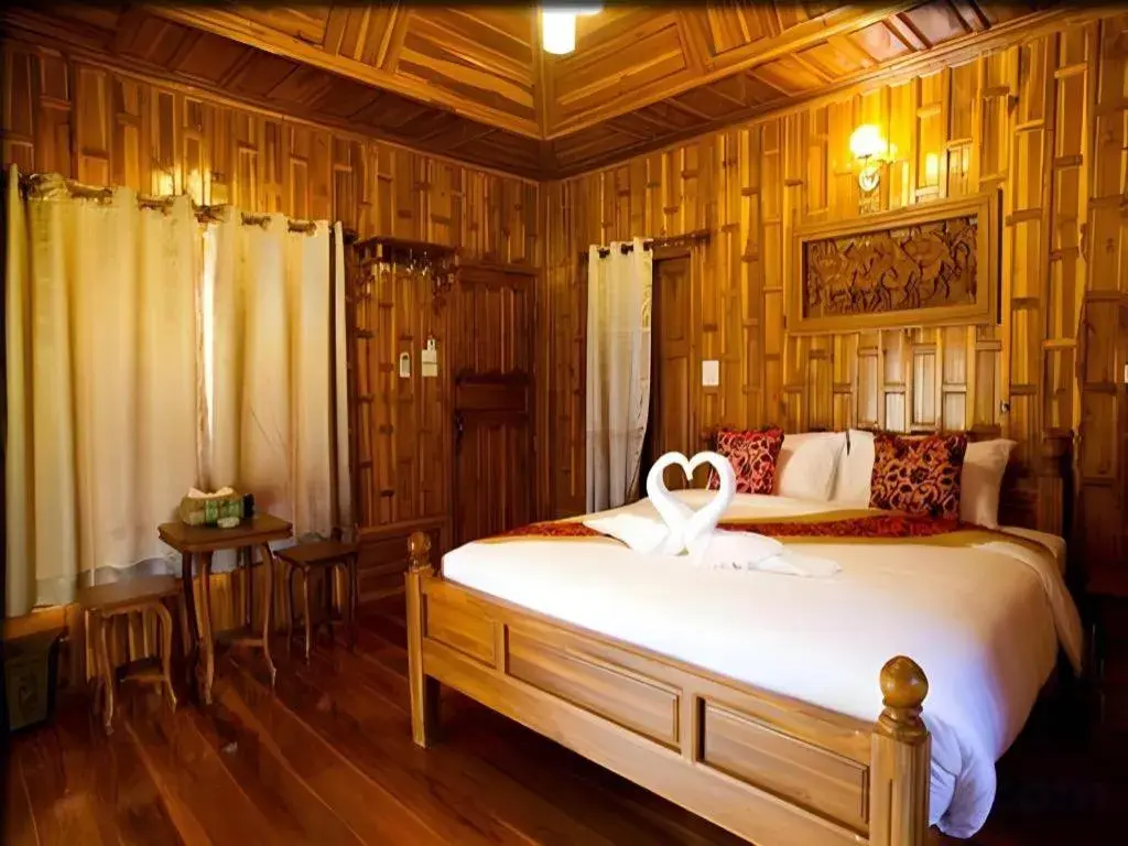 Bed in Srisawat Resort Bed in Srisawat Resort