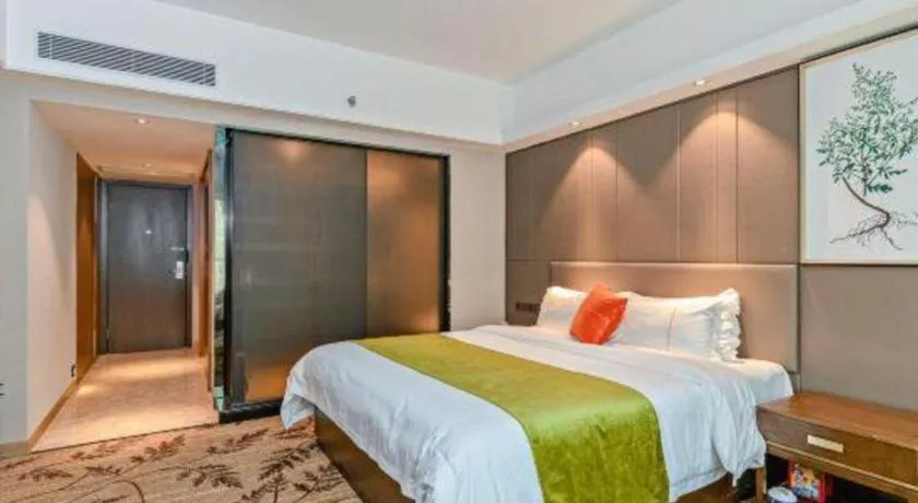 Bed in New Pearl River Hotel