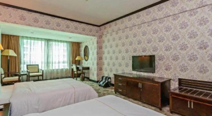 Bed in New Pearl River Hotel
